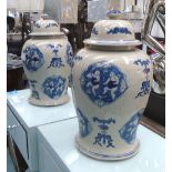 TEMPLE JARS, a pair, Chinese style, in blue and white, 43cm H.