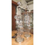 TABLE LAMPS, a pair, Art Deco ball type in a chromed frame, 77cm H.