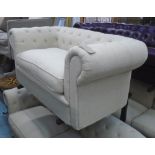 CHESTERFIELD STYLE SOFA, two seater in a sand coloured upholstery, 180cm x 82cm x 68cm approx.