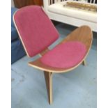 EASY CHAIR, in the style of the Shell chair by Hans J Wegner, in a rose coloured upholstery.