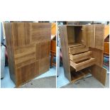 HEALS CABINET, 1970's teak with five doors and three drawers, 150cm H x 116cm W x 45cm D.