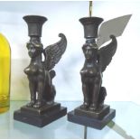 SPHINX CANDLEHOLDERS, a pair, in bronze on marble bases, 22cm H.