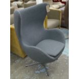 SWIVEL BASED LOUNGE CHAIR, in the style of Arne Jacobsen's Egg chair in a grey felt finish.