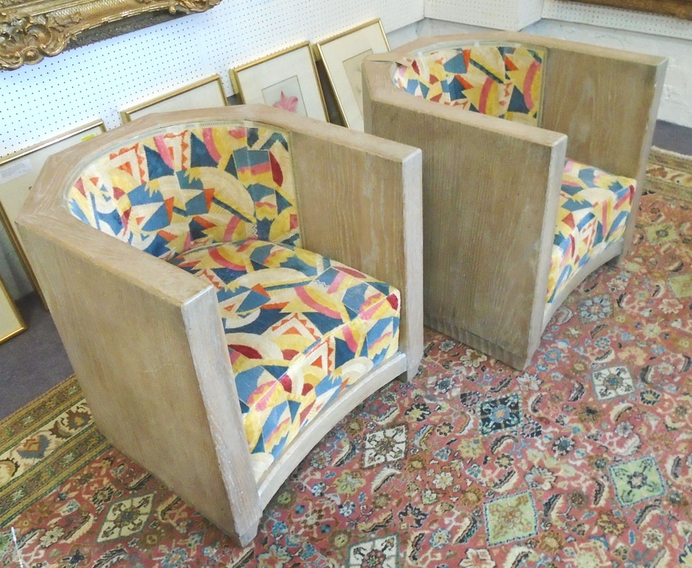 TUB CHAIRS, a pair, English 1930's Art Deco limed oak frame with concave seat rail base,