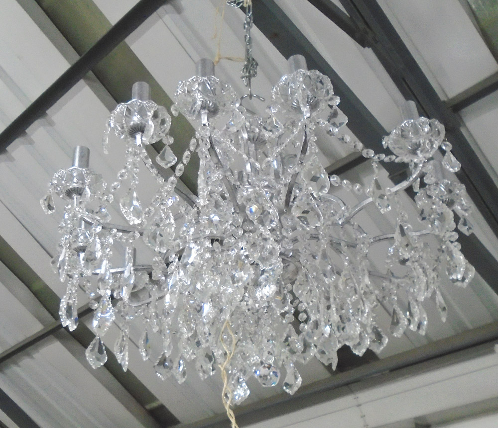 CHANDELIER, Louis XV style, twelve branch silver frame with crystal faceted drops,