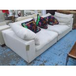 FLEXFORM SOFA, 'Everest', in an ivory upholstery on tubular bar feet, splits in two sections,