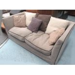 SOFA, light brown upholstery with charcoal ribbing, with various scatter cushions,
