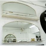 MIRRORS WITH SHELVES, a pair, with arched frames in a cream finish, 85cm x 52cm.