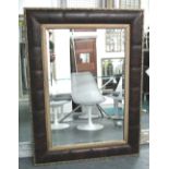 WALL MIRROR, rectangular oak and leather gilt framed.