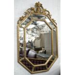 MODERN WALL MIRROR, French style, octagonal gilt with marginal plates and foliate crest,