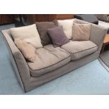 SOFA, light brown upholstery with charcoal ribbing, with various scatter cushions,