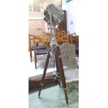 TRIPOD STAGE LAMP, polished metal on extendable wood tripod base, 176cm H.