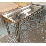 MIRRORED DRESSING TABLE, Contemporary with three drawers on tapering legs with silvered etails,