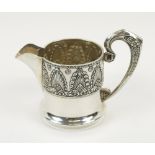 RUSSIAN SILVER JUG, early 20th century Moscow hallmarks with raised anthemium band decoration, 7.