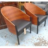 COCKTAIL CHAIRS, a pair, of tub form, with plywood backs and black seat cushions on triform bases.