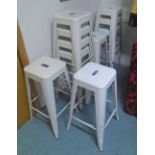 H75 STYLE BAR STOOLS, a set of ten, as originally by Tolix in a white lacquered finish, 76cm H.