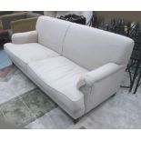 SOFA, two seater, in oatmeal fabric on turned castor supports, 198cm L.