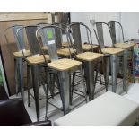 1934 STYLE BAR STOOLS, a set of nine, as originally by Tolix.