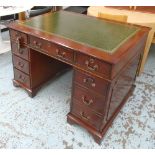 PEDESTAL DESK, in the antique taste, contemporary, with a tooled green leather top,