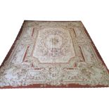 AUBUSSON STYLE NEEDLEPOINT CARPET, 350cm x 280cm, traditional rose and foliage savonnerie design.