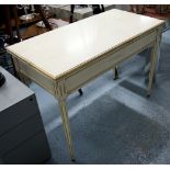 TEA TABLE, by Grange in an ivory distressed finish with gilt details on tapering fluted supports,