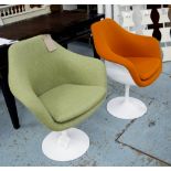 TULIP ARM STYLE CHAIRS, two, as originally by Eero Saarinen, one in an orange upholstery,