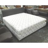 DOUBLE BED, mattress, base and grey felt headboard from Elite Beds, Switzerland,