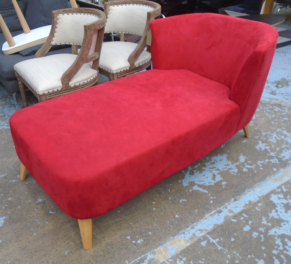CHAISE LOUNGE, in the contemporary taste in a Cadmium Red alicantra upholstery, 150cm x 90cm x 76cm.