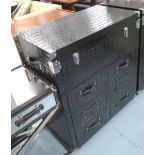 TRUNK/CHEST having rising top above six short drawers in crocodile skin patterned black leather,