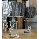 LAMPS, a pair, rectangular cut glass with black rounded shades, 63cm H.