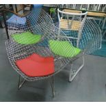 DIAMOND STYLE CHAIRS, a set of three, as originally by Harry Bertoia, in a wire work frame,