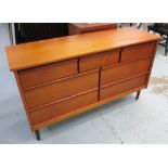 CHEST, 1970's teak having three short and two long drawers, 71cm H x 122cm W x 40cm D.