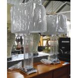 TABLE LAMPS, a pair, with circular fluted glass stems chromed metal ends with shades, 79cm H.
