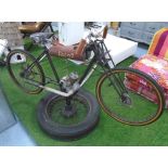 STATIC DISPLAY, early 1920's French motorcycle mounted on 1930's vintage car wheel,