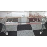 LOW TABLE, rectangular canted corner glass and lucite framed, 79cm D x 39cm H x 120cm W.