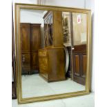 WALL MIRROR, gilt and silver framed, with large rectangular plate, 165cm x 138cm.