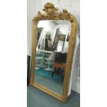 MIRROR, Louis XV style, bevelled in a gilded frame, 165cm x 90cm.