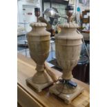 TABLE LAMPS, a pair, in wood urn style on square bases, 64cm H.