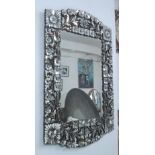 WALL MIRROR, carved wood with applied mirrored sections to form a floral design, 65CM w X 106cm H.