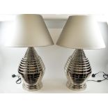 TABLE LAMPS, a pair, chrome ribbed design with matching shades, 84cm H.