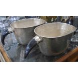 WINE BUCKETS, a pair, with hammer decoration and with faux horn handles, 62cm L.