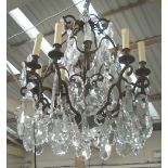 CHANDELIER, eight branch with glass drops in a bronzed frame, 73cm H plus chain.