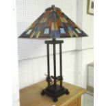 TABLE LAMP, Tiffany design on bronze metal stand, 73cm H, shade 39cm x 39cm.