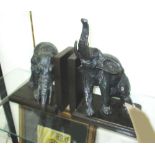 BRONZE BOOKENDS, of two drunken elephants, in a verdigris finish, 18cm L.