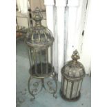 LANTERNS ON STANDS, a pair, Continental style, glazed gilded metal frames.