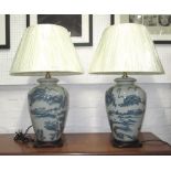 TABLE LAMPS, a pair, blue and white Chinese bases, pleated ivory colour shades, 72cm H x 45cm.