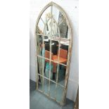 ARCHITECTURAL MIRRORS, a pair, Gothic style, in distressed effect painted metal frames,