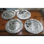 SEAFOOD PLATTERS, a set of four, with seashore designs, in plated silvered metal, 34cm diam.