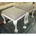 FOOTSTOOLS, a pair, in neutral fabric on distressed painted ball and claw supports,