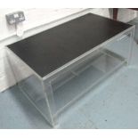 LOW TABLE, with a rectangular black faux ostrich skin patterned top on a perspex base,